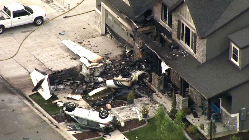 A frame from video shows the scene where Duane Youd flew a Cessna 525 CitationJet into his own home early Monday, Aug. 13, 2018, in Payson, Utah. Youd, 47, was killed in the crash, which took place after he was charged with assaulting his wife the night before. The wife and her son, who were inside the house when the plane struck it, were unharmed.