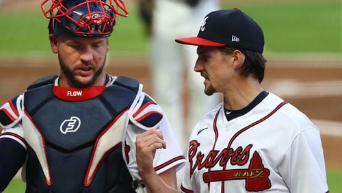 090820 Atlanta: Atlanta Braves pitcher Kyle Wright confers with catcher Tyler Flowers at the end of the second inning against the Miami Marlins in a MLB baseball game on Tuesday, Sept. 8, 2020 in Atlanta.   “Curtis Compton / Curtis.Compton@ajc.com”