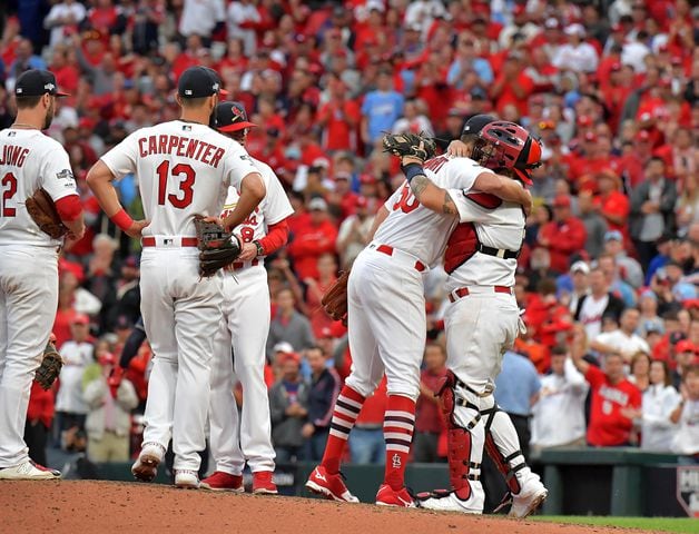 Photos: Braves win in dramatic fashion, lead Cardinals 2-1 in NLDS