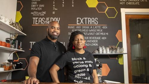 04/30/2020 - Atlanta, Georgia - Just Add Honey Tea Company owners Brandi and Jermail Shelton stand for a photo at their shop, located at 684 John Wesley Dobbs Avenue, in Atlanta’s Old Fourth Ward neighborhood, Thursday, April 30, 2020. They have switched their focus to online orders during the COVID-19 pandemic. (ALYSSA POINTER / ALYSSA.POINTER@AJC.COM)