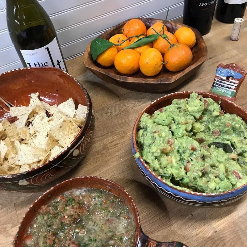 Salsa and guacamole from “Turnip Greens & Tortillas” by Eddie Hernandez and Susan Puckett were available as fuel for the cooks. CONTRIBUTED BY SUSAN PUCKETT