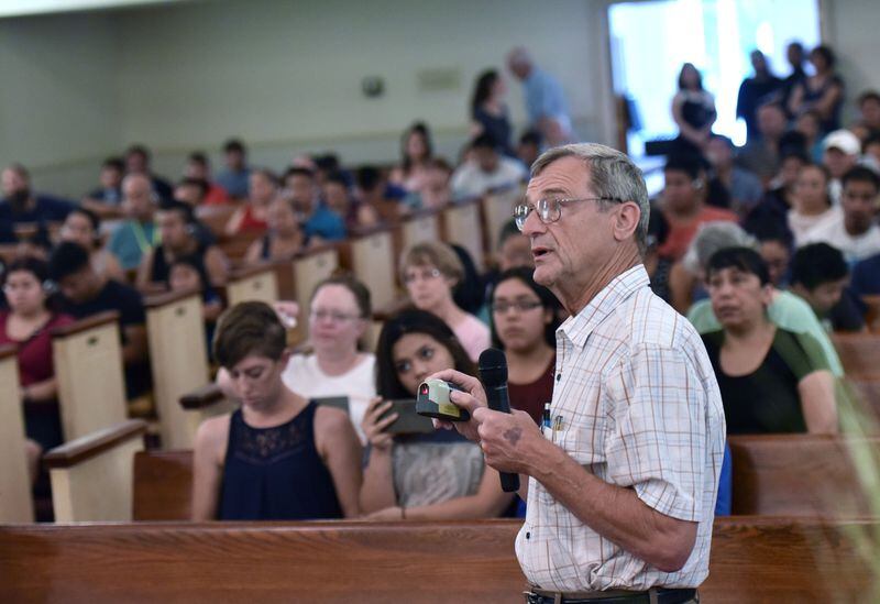 John Lantz, manger of Shallowford Gardens Apartments, speaks to residents during a meeting at First Baptist Church of Doraville on Wednesday, June 14, 2017. The DeKalb County School District late Monday approved the purchase of the apartment complex, to build a new elementary school to alleviate overcrowding in the Cross Keys cluster of schools. The purchase will displace dozens of families. HYOSUB SHIN / HSHIN@AJC.COM