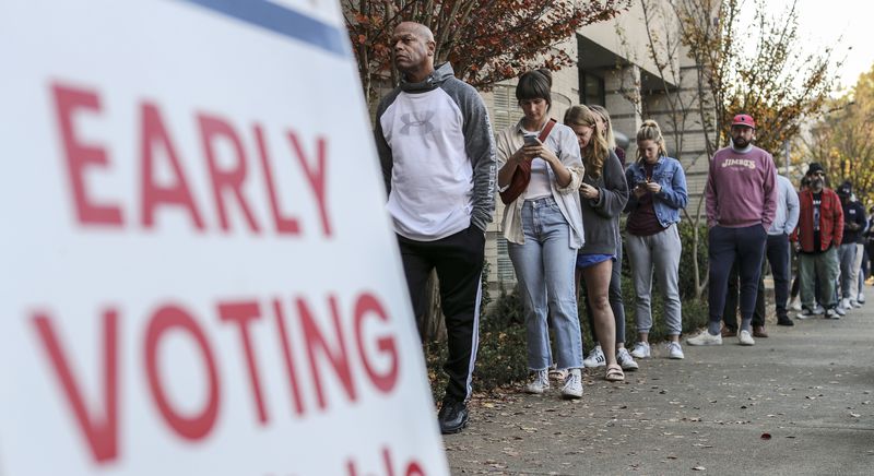 Early voters hit the polls on Nov. 4, 2022 in Atlanta. In Cobb County, election officials have been sued over their failure to mail absentee ballots to more than 1,000 voters. (John Spink/AJC) 

