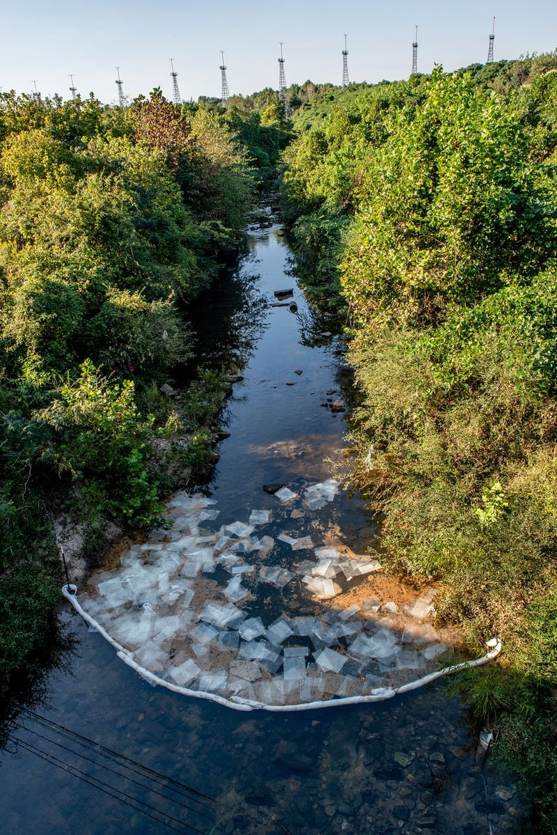 Atlanta photographer Virginie Kippelen has documented the source of Georgia'a Flint River close to Hartsfield-Jackson Atlanta International Airport. In September 2021 a 700-gallon jet fuel spill polluted river water near the airport's fifth runway and Kippelen's photo documents remediation efforts.
Courtesy of Virginie Kippelen