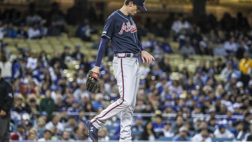 Atlanta Braves starting pitcher Max Fried looks at his hand after it was struck by liner hit by the Los Angeles Dodgers' Alex Verdugo in the second inning at Dodger Stadium in Los Angeles on Tuesday, May 7, 2019. Fried was removed from the game after the play. (Robert Gauthier/Los Angeles Times/TNS)