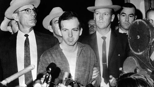 John F. Kennedy's murderer Lee Harvey Oswald during a Nov. 22, 1963, news conference after his arrest in Dallas. Oswald was killed by Jack Ruby on Nov. 24 on the eve of Kennedy's burial. (Stringer/AFP/Getty Images/TNS)