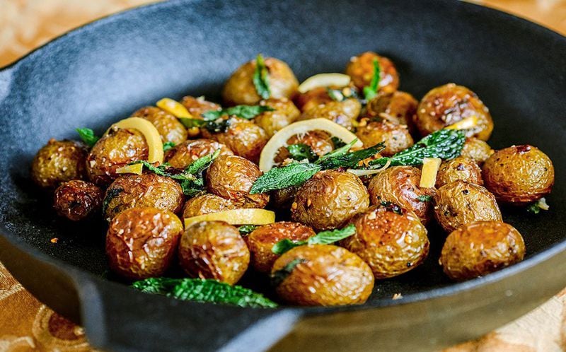 Roasted white potatoes with mint and preserved lemon. (Andrew Rush/Pittsburgh Post-Gazette/TNS)