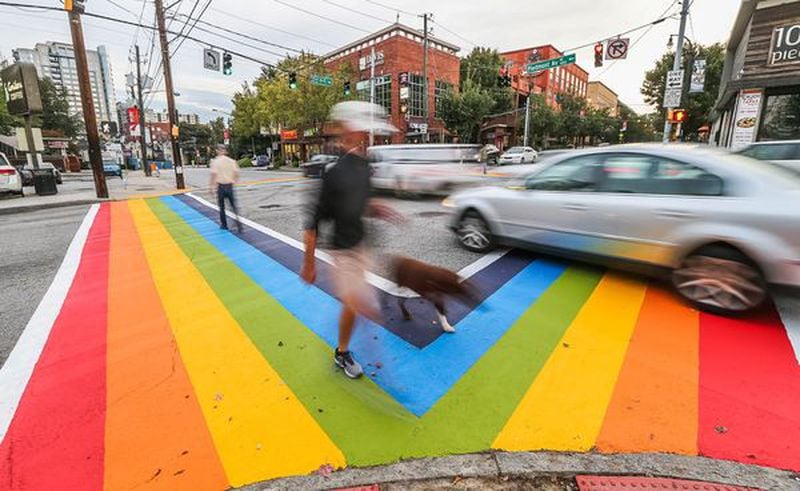 Rainbow crosswalks were painted at 10th Street and Piedmont Avenue, considered the hub of Atlanta’s LGBT community. JOHN SPINK / JSPINK@AJC.COM