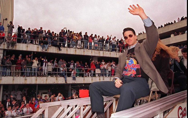 Tom Glavine, the MVP of the 1995 World Series, waves to the crowd during the victory parade following the Braves' World Series win over the Indians. (AJC file photo)