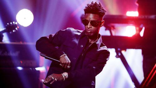Atlanta rapper 21 Savage will serve food to members of the community on Tuesday.