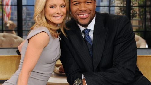 Kelly Ripa and Michael Strahan during happier times together on the set of their morning TV show (AP Photo/Disney-ABC Domestic TV, Sandy SooHoo)