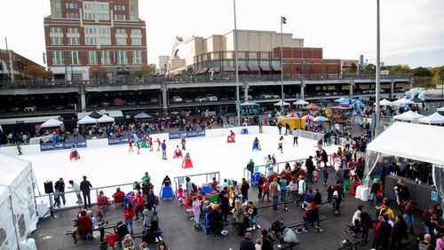 People ice skate during the Light The Station 2018 at Atlantic Station. STEVE SCHAEFER / SPECIAL TO THE AJC