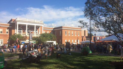 Students, professors and other Farmville locals celebrate the vice presidential debate at a festival on Longwood University's quad. Tamar Hallerman/AJC