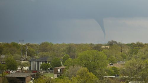 A tornado touches down north of Lincoln, Neb., on Friday, April 26, 2024. (Kenneth Ferriera/Lincoln Journal Star via AP)