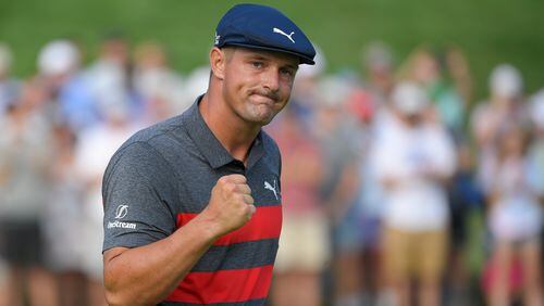Bryson DeChambeau reacts after sinking his putt on the 16th green during the final round of the BMW Championship Sunday, Aug. 29, 2021, at Caves Valley Golf Club in Owings Mills, Md. (Nick Wass/AP)