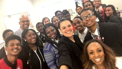 Donyall Dickey, in the back left, wearing the white shirt and glasses, of this group selfie with his APS boss Meria Carstarphen, could be bound for Portland, Oregon, as he is the sole finalist announced today to lead that system.