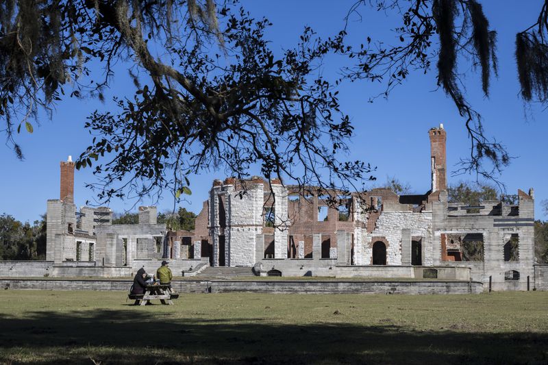CUMBERLAND ISLAND, GA - DECEMBER, 26, 2022: A couple from Montana eat lunch near the ruins of Dungeness on the south end of the National Seashore, Monday, Dec. 26, 2022, in Cumberland Island, Georgia. (AJC Photo/Stephen B. Morton)