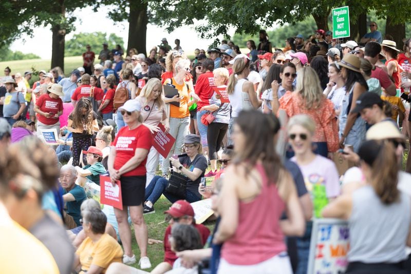 People gather in Piedmont Park before a rally organized by Georgia Moms Demand Action on Saturday, May 13, 2023. The rally was part of a national series of protests the day before Mother’s Day to highlight the mounting toll of gun violence.  (Steve Schaefer/steve.schaefer@ajc.com)