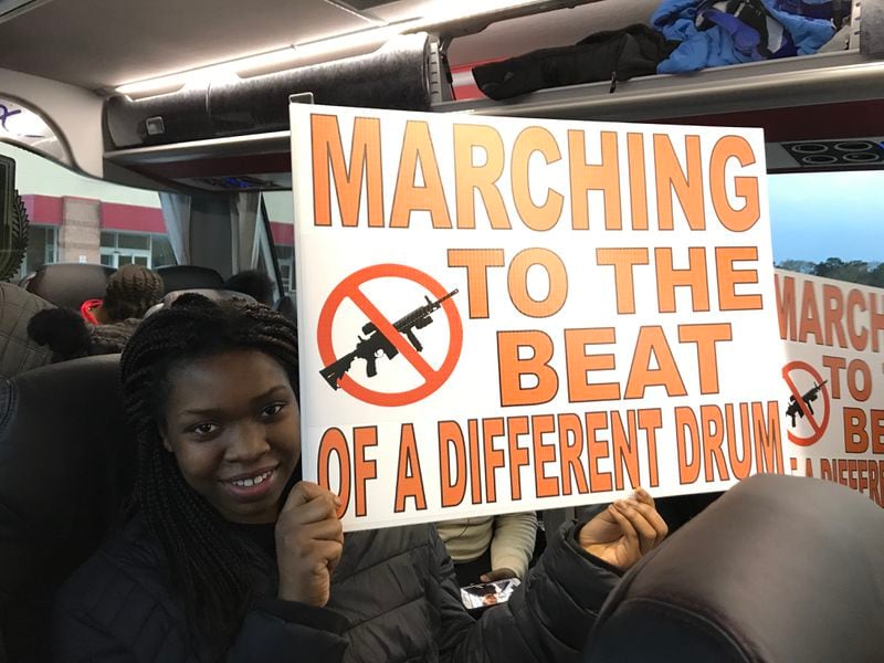 Chioma Anyanwoke, 14, from Cobb County on a bus to the March for Our Lives in Washington.