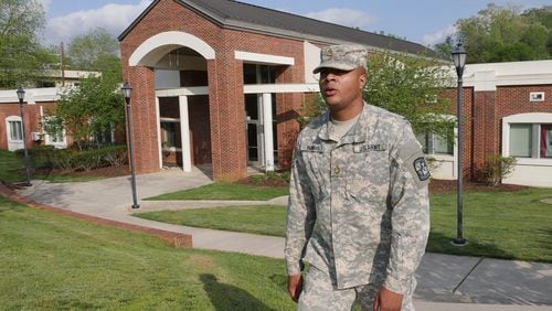 Dante Harris leaves the Military Leadership Center on University of North Georgia Dahlonega Campus. He is now facing suspension and the possible loss of a $70,000 scholarship, as well as a felony charge and a misdemeanor charge. HYOSUB SHIN / HSHIN@AJC.COM