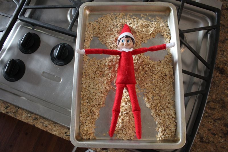 The Elf on the Shelf makes a snow angel in oatmeal. CONTRIBUTED BY CHILDREN’S HEALTHCARE OF ATLANTA 