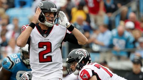 Matt Ryan of the Falcons makes a call against the Panthers in the third quarter during their game Sunday at Bank of America Stadium in Charlotte, North Carolina.