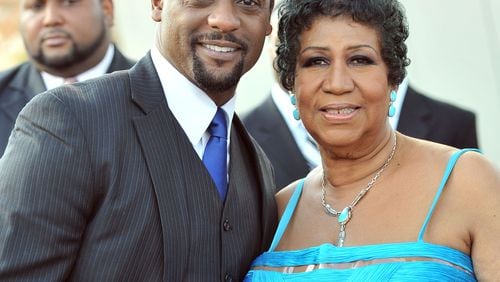Aretha Franklin, posing with actor Blair Underwood, delighted everyone at the 2012 Trumpet Awards, held annually in Atlanta. AJC file photo: Hyosub Shin.