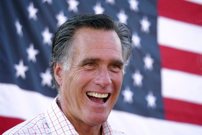 FILE - Mitt Romney smiles during a campaign event, June 20, 2018, in American Fork, Utah. (AP Photo/Rick Bowmer, File)