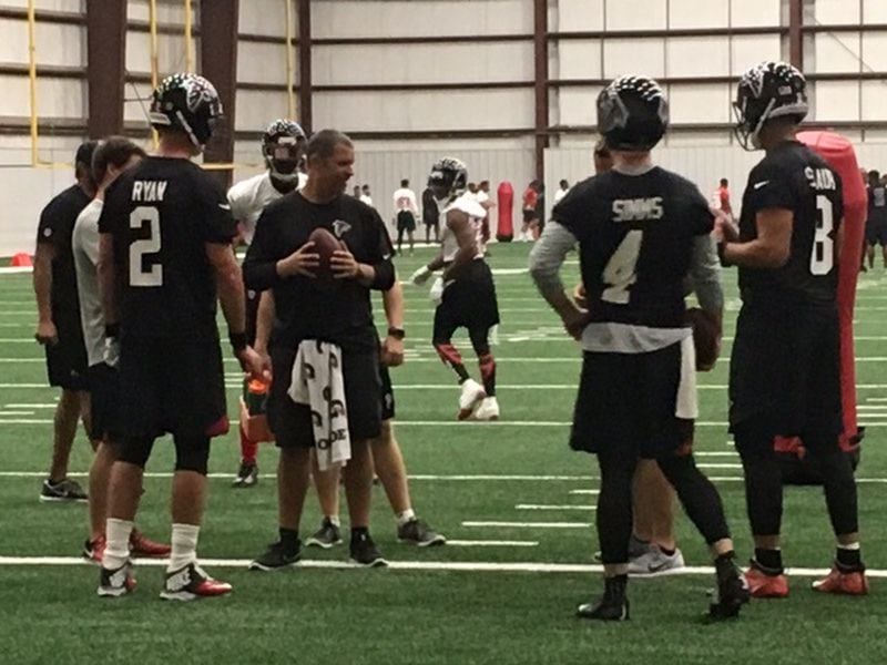  Falcons quarterback Matt Ryan receiving some instruction at practice on Tuesday. (By D. Orlando Ledbetter)