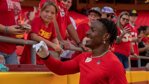 Kansas City Chiefs wide receiver Mecole Hardman signs autographs before a preseason game against the Green Bay Packers at Arrowhead Stadium on Thursday, Aug. 25, 2022.  (Emily Curiel/The Kansas City Star/TNS)