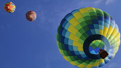 A hot air balloon, similar to the ones pictured here, amde a hard landing at a festival in Missouri Saturday evening, scaring spectators and  injuring a young girl.