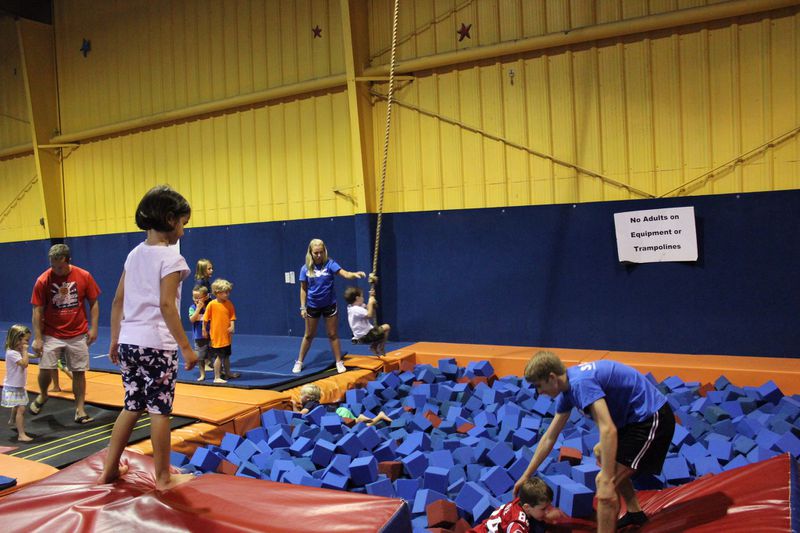 Kids can enjoy two in-ground tumble tracks, an extra-large foam pit and rope swing at Champion Kids in Marietta. Courtesy of Champion Kids