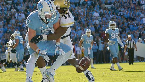CHAPEL HILL, NC - NOVEMBER 05: Lance Austin #17 of the Georgia Tech Yellow Jackets breaks up a pass in the end zone intended for Austin Proehl #7 of the North Carolina Tar Heels during the game at Kenan Stadium on November 5, 2016 in Chapel Hill, North Carolina. North Carolina won 48-20. (Photo by Grant Halverson/Getty Images)