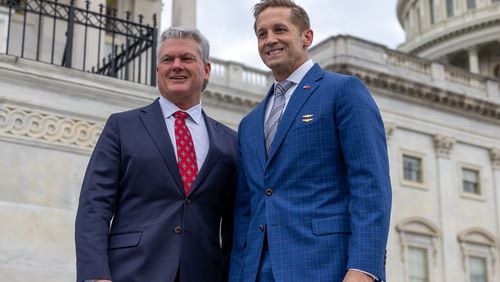 Newly elected Reps. Mike Collins (R-GA), and Rich McCormick (R-GA) take photos on the steps of the U.S. Capitol in Washington, DC on November 15th, 2022. On Nov. 14, 2023, both voted against a measure to temporarily fund the government and avoid a shutdown.