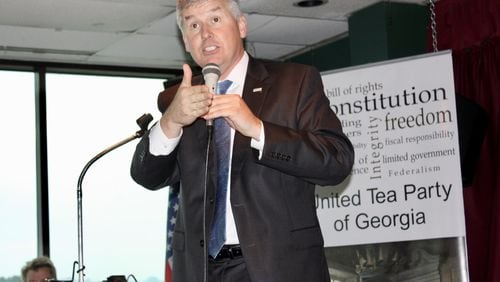 U.S. Rep. Rob Woodall, R-Ga., responds to questions at Thursday’s meeting with the United Tea Party of Georgia in Lawrenceville. Thursday, June 1, 2017. Woodall’s participation in the event was kept secret to keep away progressive critics. Like many members of Congress, Woodall has not scheduled any public town halls during the legislative break. CHRIS JOYNER / CJOYNER@AJC.COM