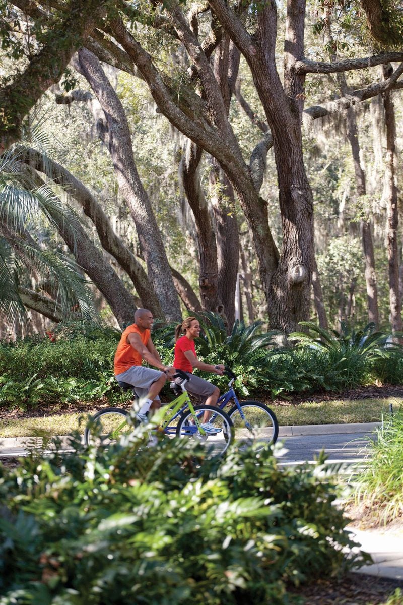 Cyclists ride beneath the live oak trees at Omni Amelia Island Resort. 
Courtesy of Omni Amelia Island.