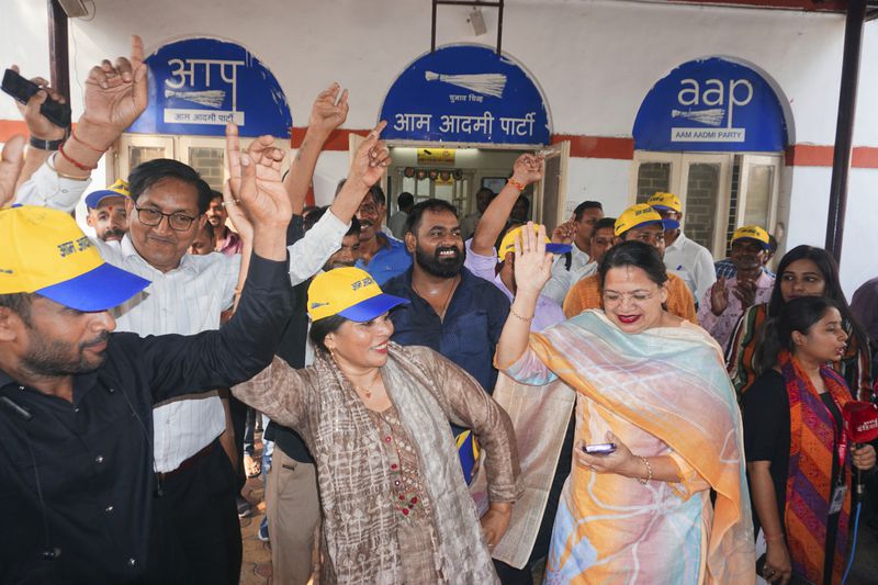 Supporters of the Aam Aadmi Party, or Common Man’s Party celebrate at their party office after the Supreme Court granted interim bail to their leader Arvind Kejriwal, in New Delhi, India, Friday, May 10, 2024. Kejriwal was arrested nearly seven weeks ago in a bribery case that opposition parties called a political move by Prime Minister Narendra Modi's government against his rivals during a national election. (AP Photo/Dinesh Joshi)