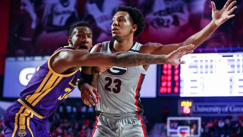 Georgia center Braelen Bridges (23) calls for the ball as LSU's Shawn Phillips defends during an SEC game Stegeman Coliseum in Athens on Tuesday, Feb. 14, 2023. (Photo by Tony Walsh/UGA Athletics)
