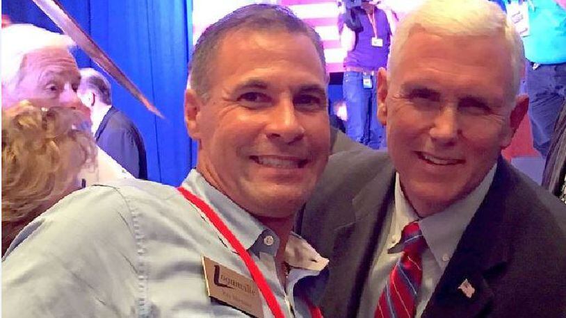Rey Martinez, then a Loganville city councilman, with then-vice presidential candidate Mike Pence, during a September 2016 rally in Cobb County. VIA CITY OF LOGANVILLE