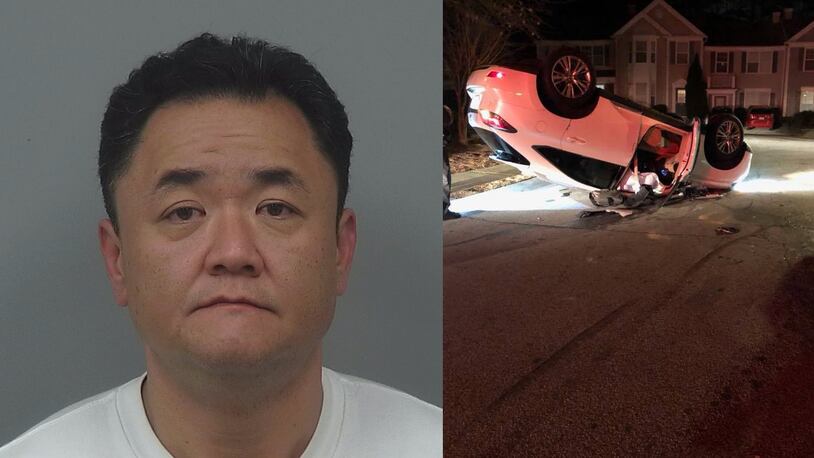 Kyu Jin Lim, 46, was charged with DUI, reckless driving, driving too fast for conditions and improper lane change after his car allegedly clipped a parked vehicle and flipped over in a Duluth neighborhood.