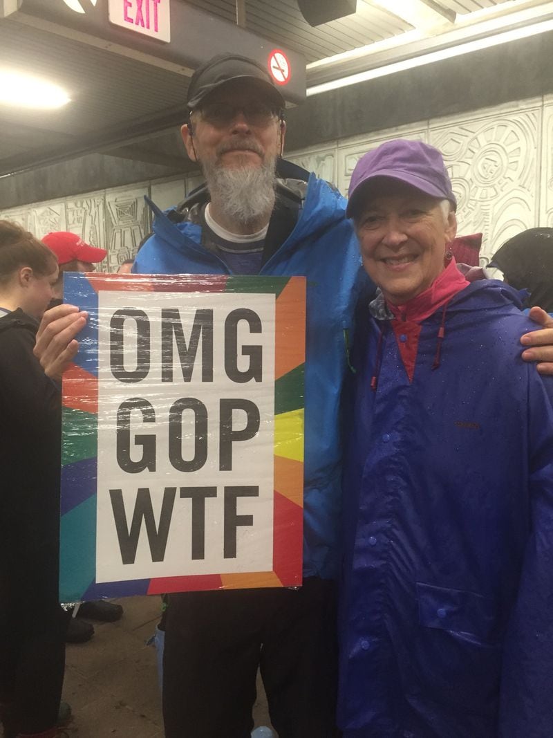 Terry Hamrick (left) and Sue Hunter at the Midtown Arts Center MARTA station as they headed to Saturday's Atlanta March for Social Justice and Women.