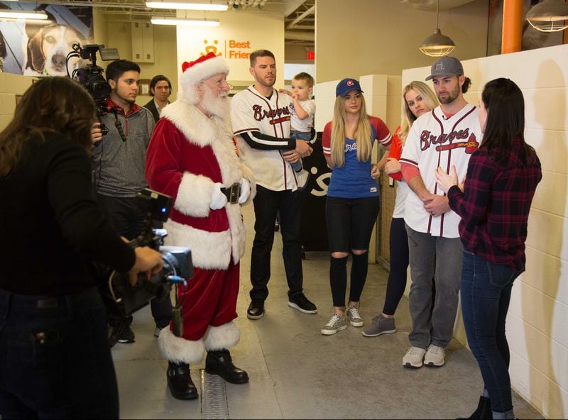 The Atlanta Braves front office staff, Freddie and Chelsea Freeman, Sarah and Charlie and visited Best Friends in Atlanta as part of the team's Season of Giving on Wednesday, Dec. 12, 2018. The animal shelter works collaboratively with area shelters, animal welfare organizations and individuals to save the lives of pets in shelters in the South. (Photo by Phil Skinner)