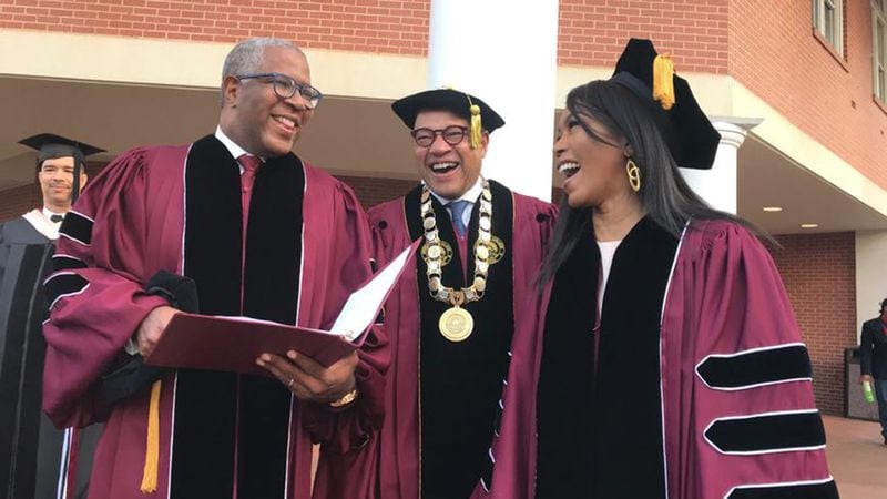 Tech billionaire Robert F. Smith (from left), Morehouse College President David A. Thomas and actress Angela Bassett prepare to walk to the graduation ceremonies at the college on Sunday, May 19, 2019. Smith and Bassett received honorary degrees. (Bo Emerson / AJC file photo)