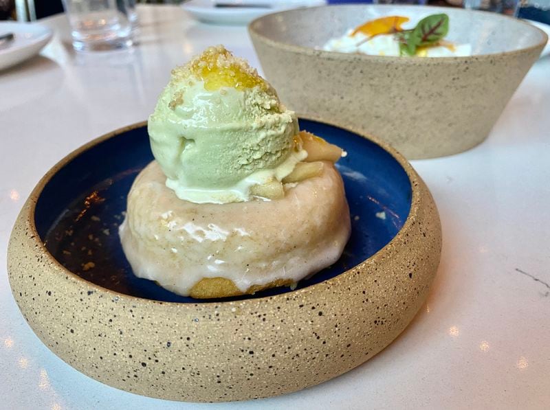 One of the desserts available at Bastone is a buttermilk donut with a scoop of tarragon ice cream.  Ligaya Figueres/ligaya.figueras@ajc.com