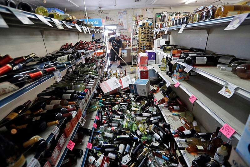 Bottles of wine are strewn in the middle of an aisle inside a Southern California store on July 6 after the largest earthquake the region had seen in nearly 20 years.