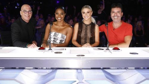 This image released by NBC shows celebrity judges (from left) Howie Mandel, Gabrielle Union, Julianne Hough and Simon Cowell on the set of “America’s Got Talent” in Los Angeles. Union recently thanked supporters for defending her amid reports she was fired from “America’s Got Talent” after complaining about racism and other issues. TRAE PATTON / NBC VIA AP