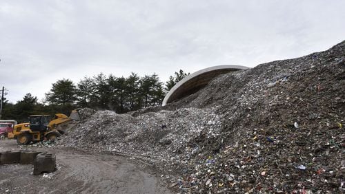 A pile of mixed recyclable materials sits at Strategic Materials recycling facility in College Park on Dec. 22. HYOSUB SHIN / HSHIN@AJC.COM