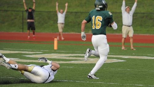 Blessed Trinity tight end JD Bertrand races to the end zone for a touchdown against St. Pius during the first half Friday, Aug. 28, 2015, in Roswell. (John Amis/Special to the AJC) Blessed Trinity tight end JD Bertrand races to the end zone for a touchdown against St. Pius during the first half Friday, Aug. 28, 2015, in Roswell. (John Amis/Special to the AJC)
