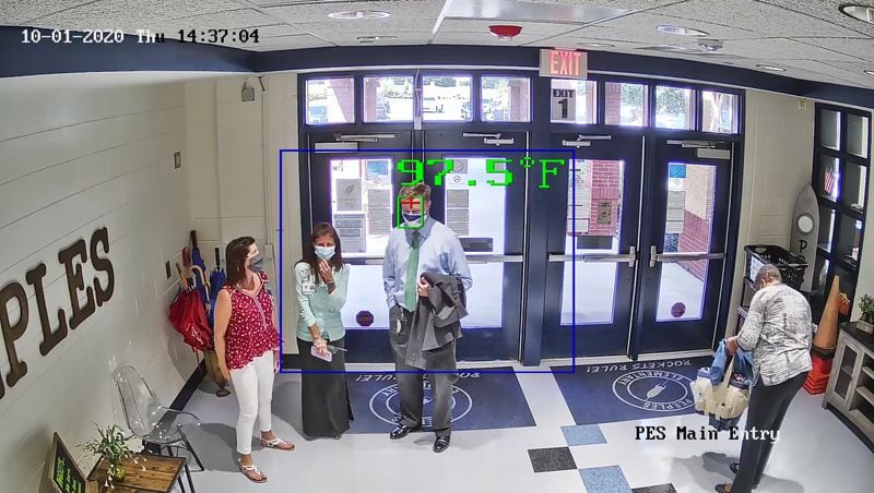 Fayette County schools in August installed 75 thermal imaging cameras at its schools to detect when people have elevated body temperatures. The district purchased the cameras, which are integrated in the district’s security system, from Hikavision for $525,000. Pictured here is a camera reading the temperature of School Superintendent Jonathan Patterson in the lobby of Peeples Elementary School. Credit: Fayette County schools