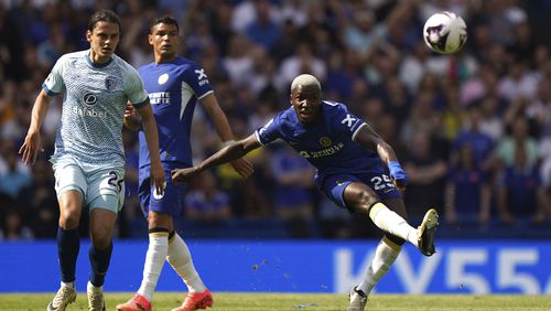 Chelsea's Moises Caicedo scores their side's first goal of the game from the half-way line during the Premier League match between Chelsea FC and AFC Bournemouth at Stamford Bridge, London, Sunday May 19, 2024. (Bradley Collyer/PA via AP)